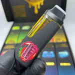 Empty vape pen close up with sleek design and mouthpiece.